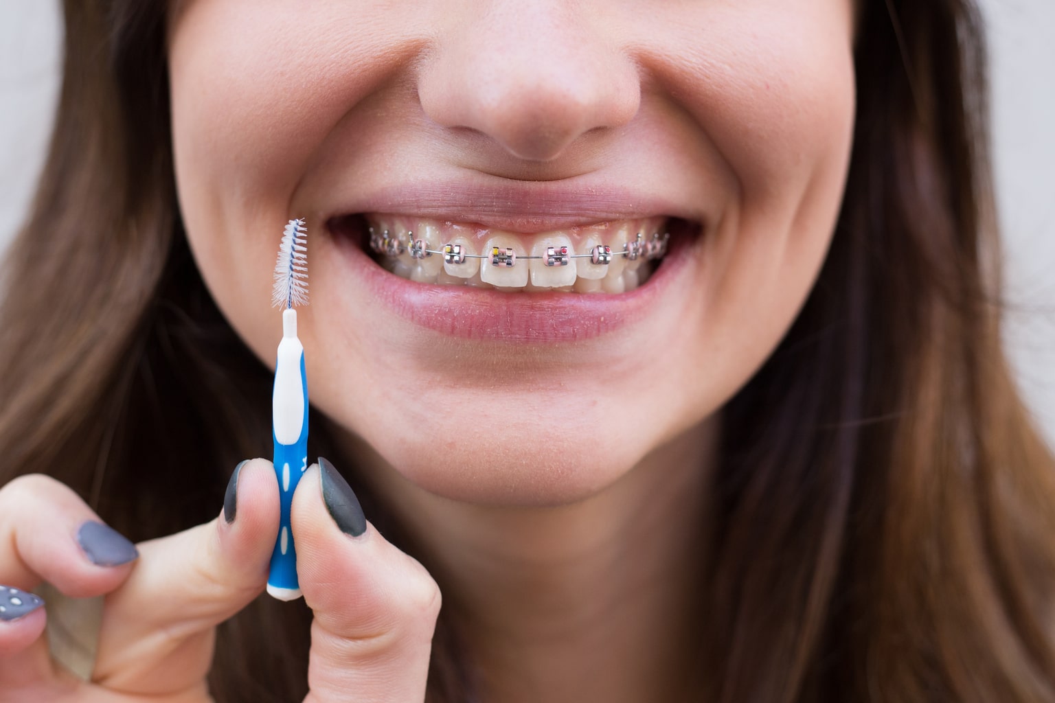 Come usare lo scovolino per Pulire i denti per la tua igiene orale